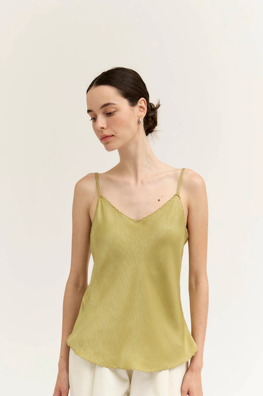 Scallop edge bias tank