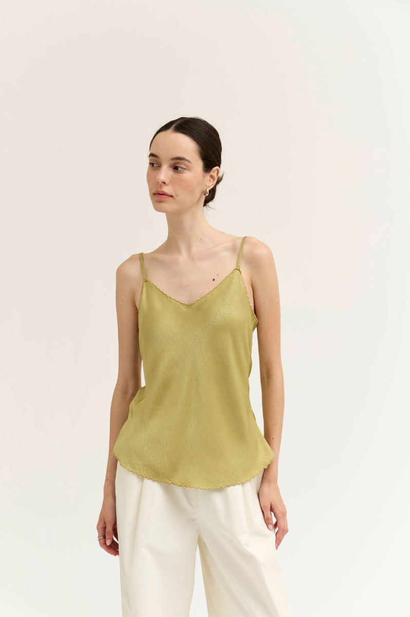 Scallop edge bias tank