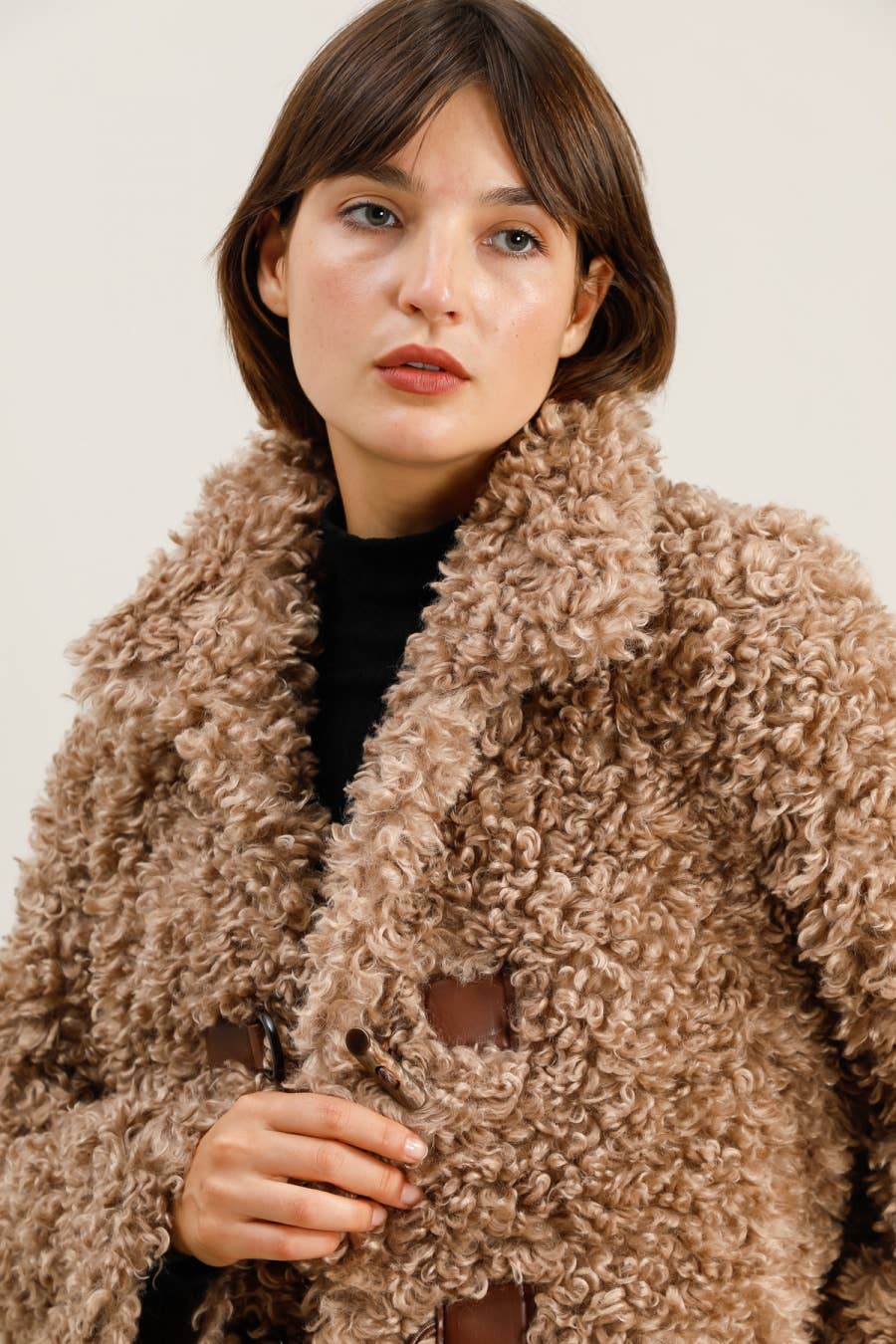 Shearling effect coat with toggle fastenings